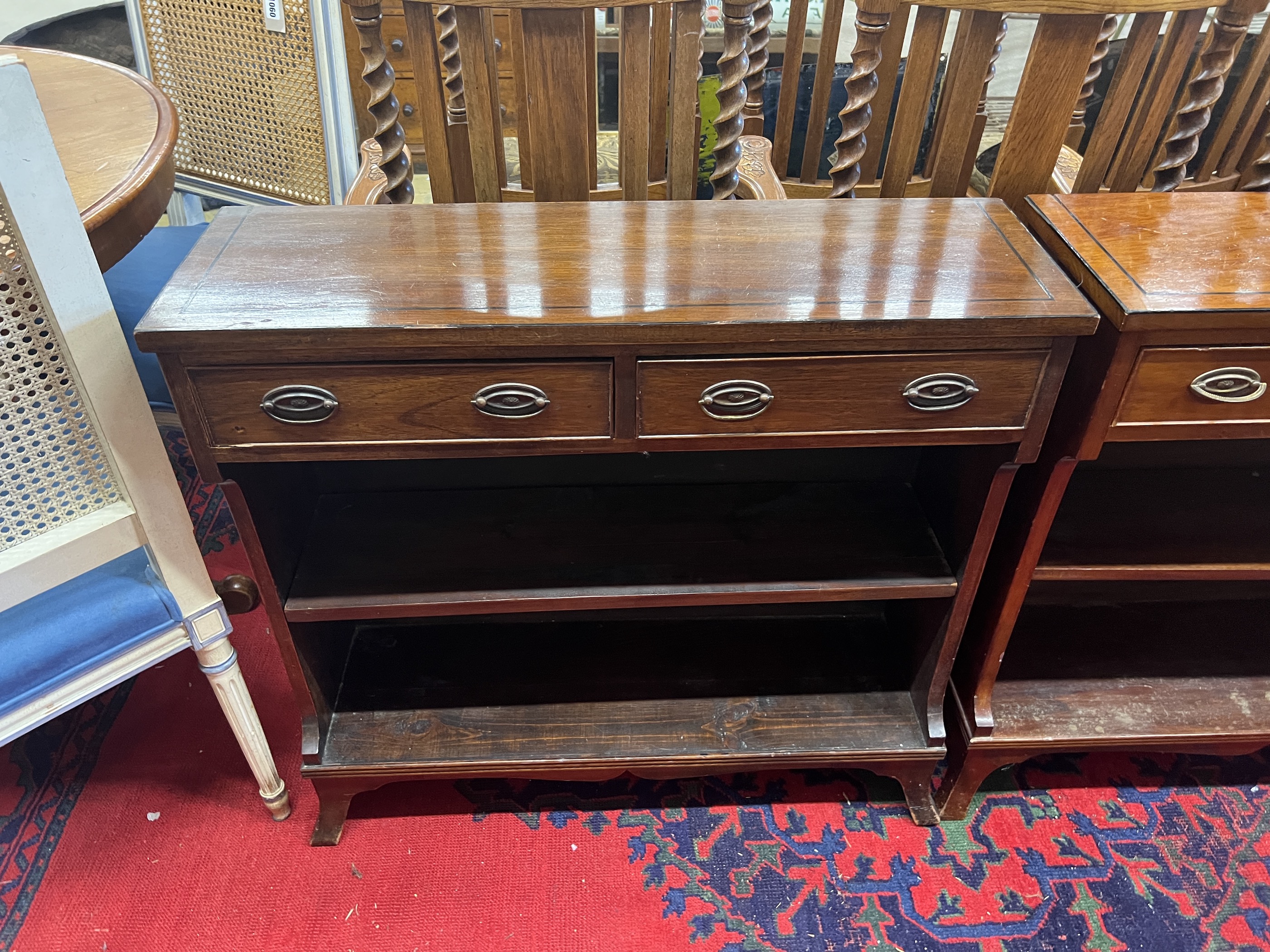 A pair of reproduction George III style mahogany open bookcases, width 80cm, depth 25cm, height 76cm